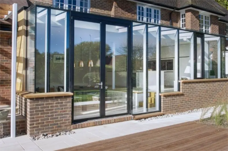 double-opening-aluminium-casement-patio-doors-from-Schuco-used-in-a-glass-extension